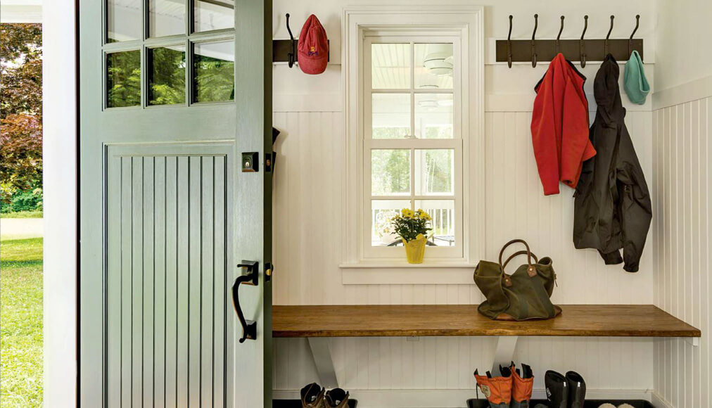A door that is opening into a mudroom