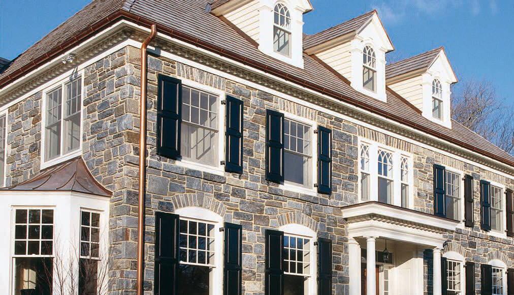 Outside view of a house showcasing gutters.