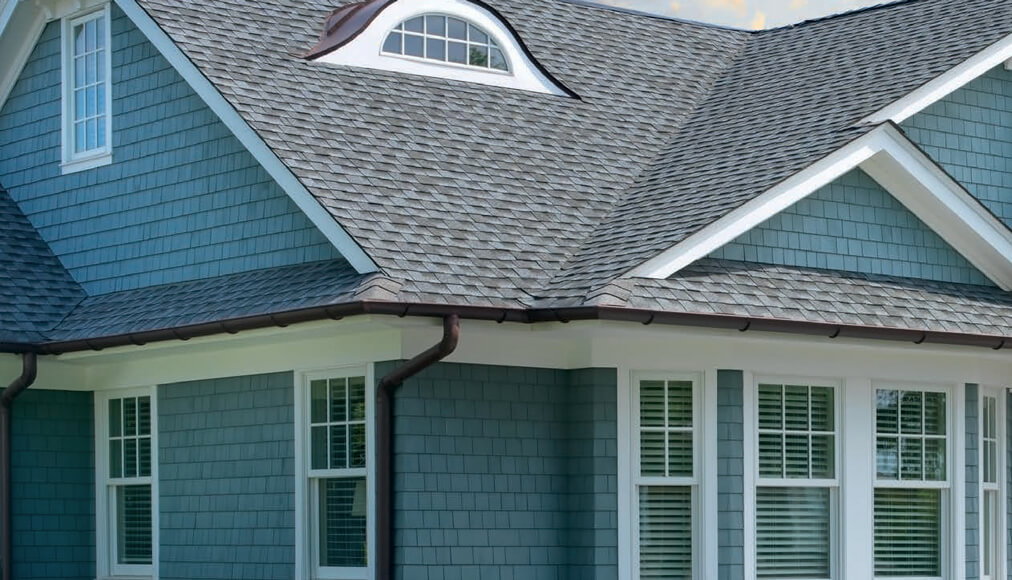 Outside view of a house and roof.