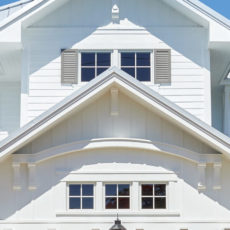 Outside view of a sloped roof on a house.