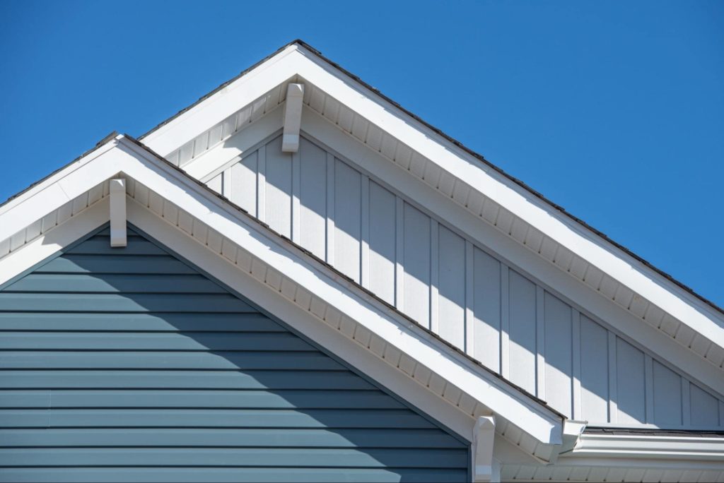 A picture of vinyl siding on an A-frame house.