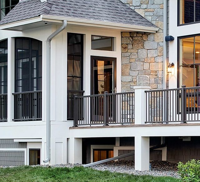 Outside view of a modern house with deck.