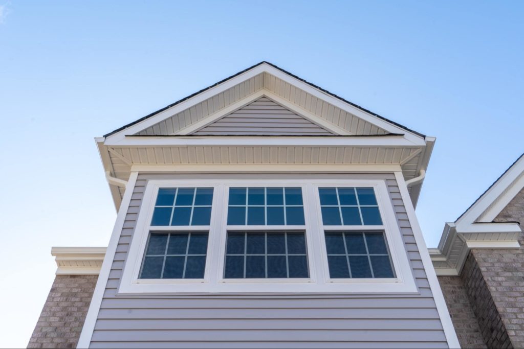 A picture of a house with double hung windows.