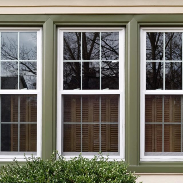 Outside view of three windows in a row.