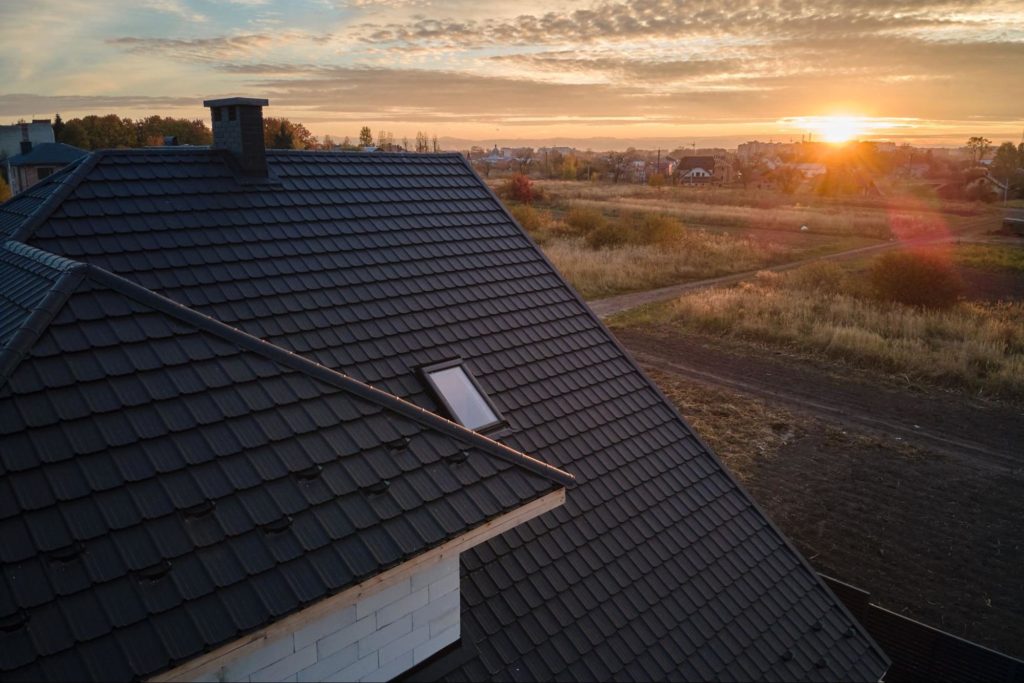 A picture of a roof with slate shingles.