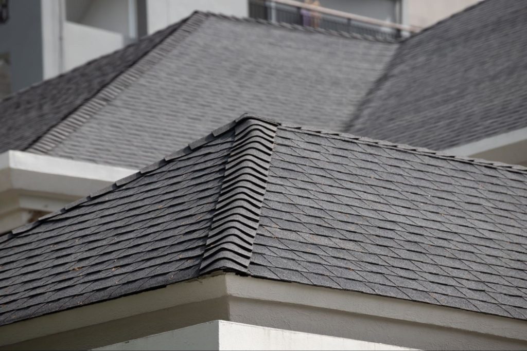 A picture of a roof with rubber composite shingles.