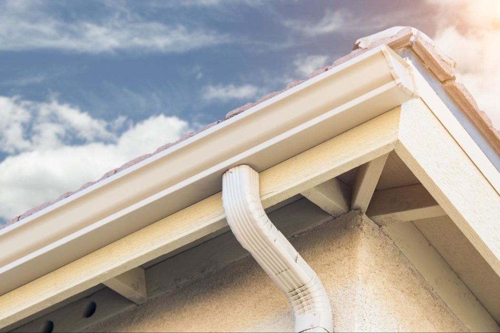 A close-up picture of white gutters.