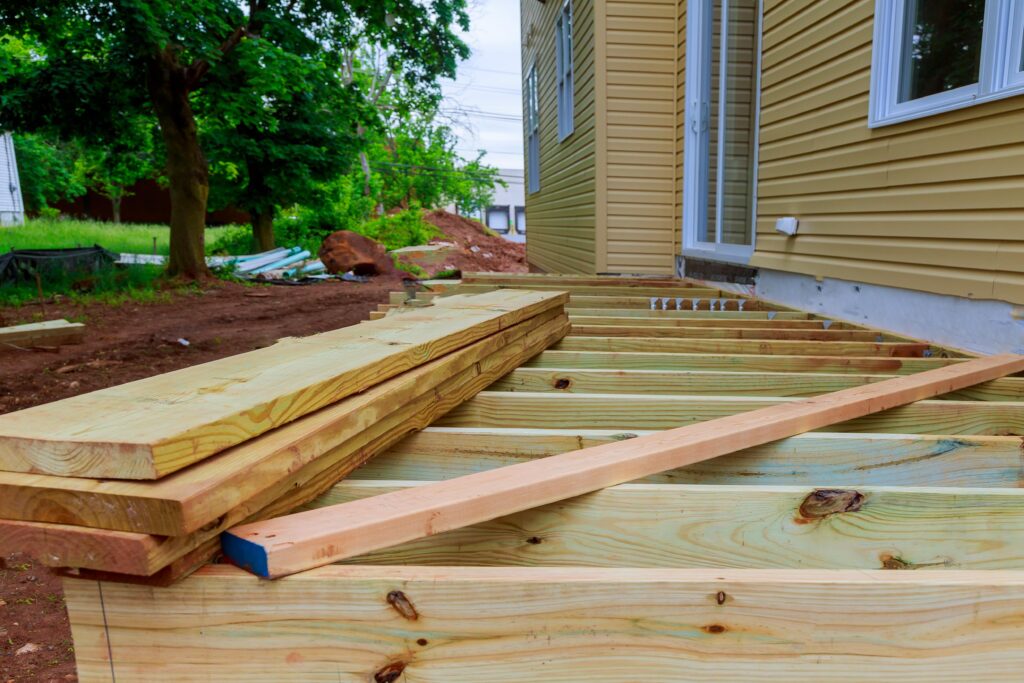 An image of a deck being built at ground level.